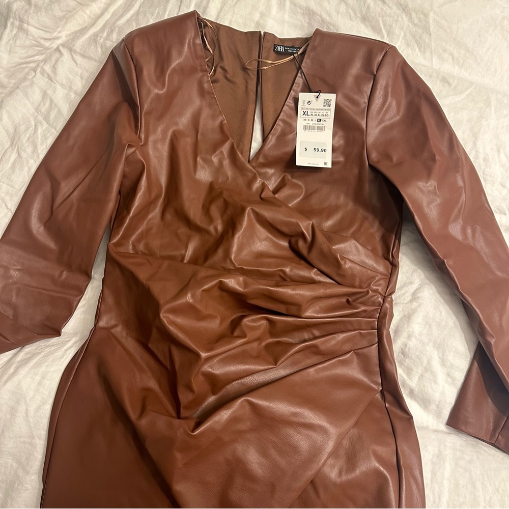 Never been worn brown faux leather dress